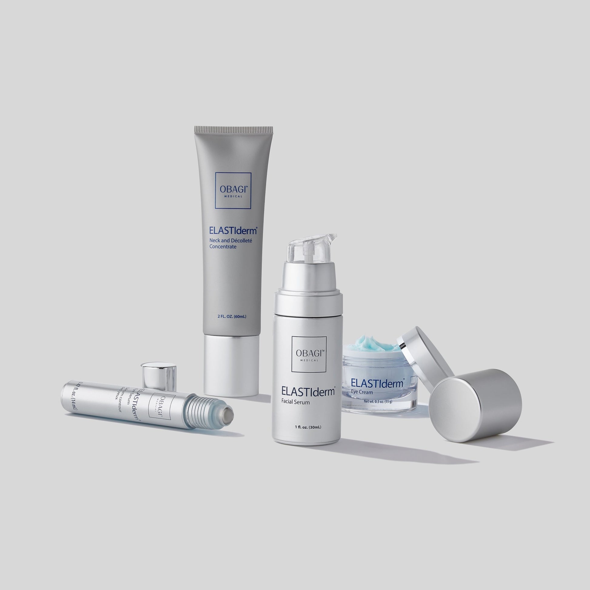 Collection of Obagi ELASTIderm skincare products on a light gray background