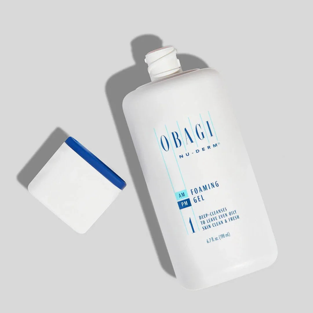 Obagi Nu-Derm Foaming Gel bottle on a light gray background