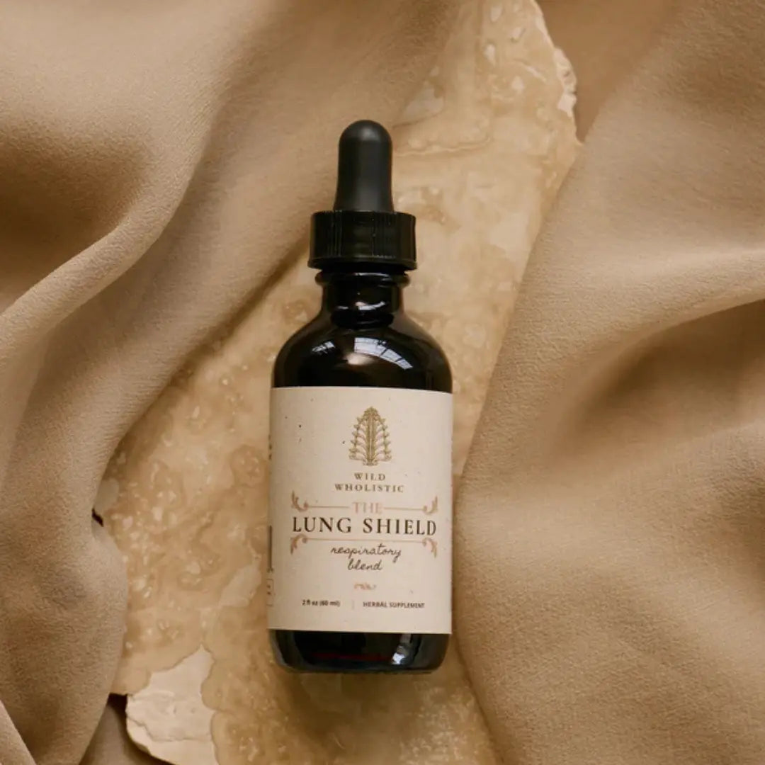 Bottle of 'Lung Shield' supplement on a beige fabric background