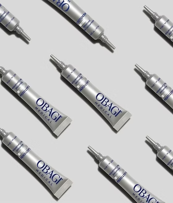 Multiple Obagi Medical skincare products arranged on a light gray background