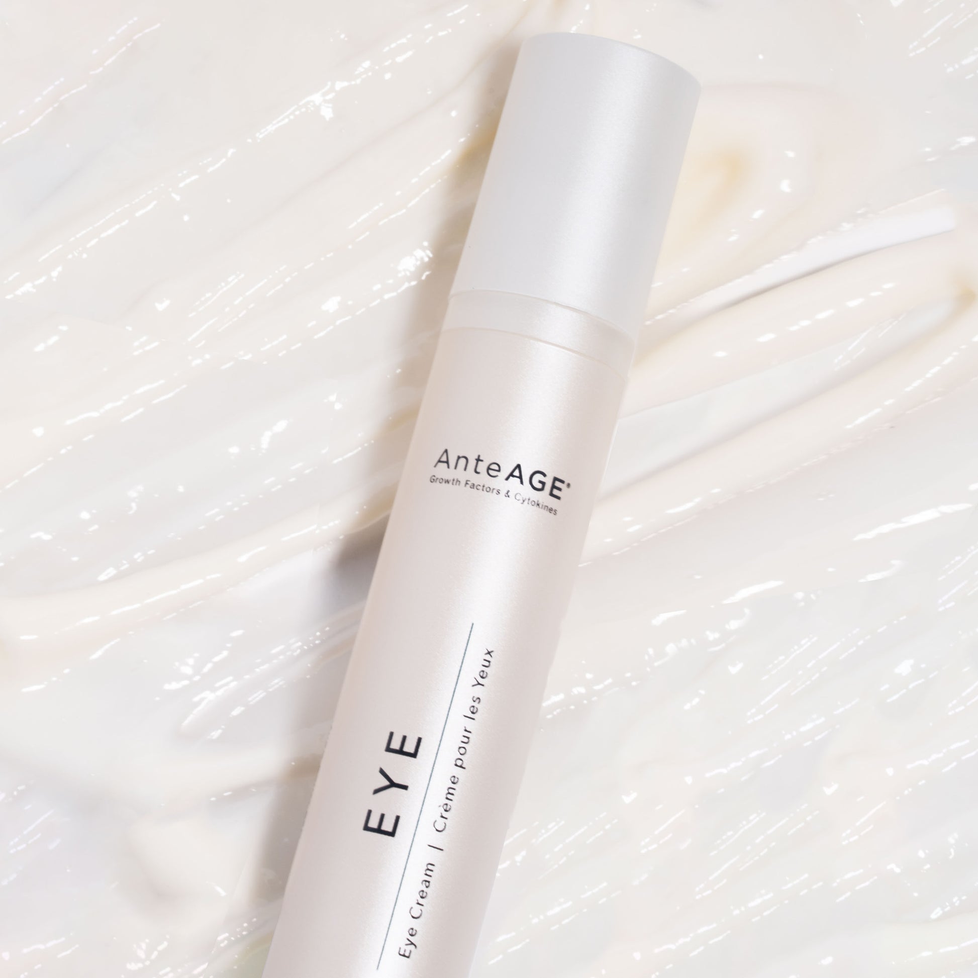 Skincare bottle labeled 'AnteAGE EYE' on a textured white background