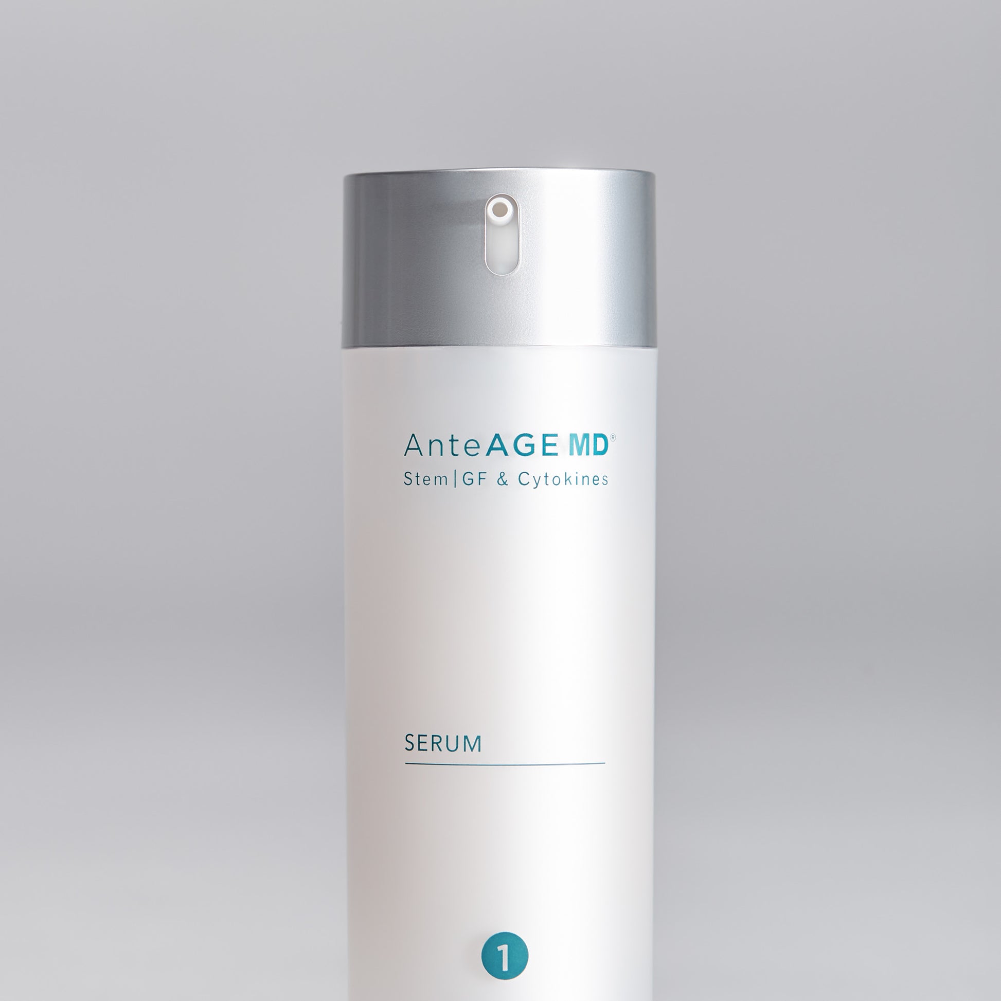 AnteAGE MD serum bottle on a gray background