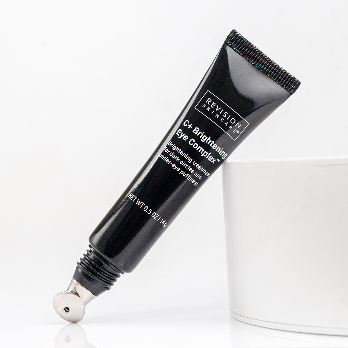 Revision Skincare C+ Brightening Eye Complex tube on a white background