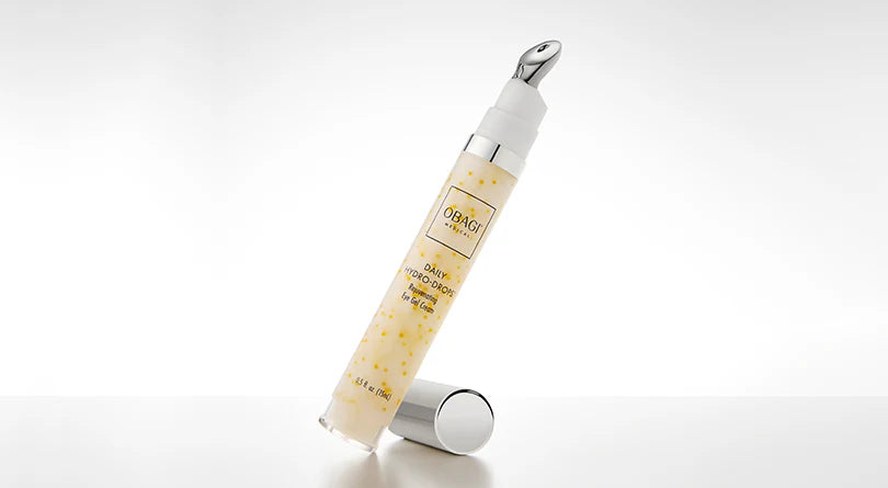 Two skincare bottles by Obagi on a white background
