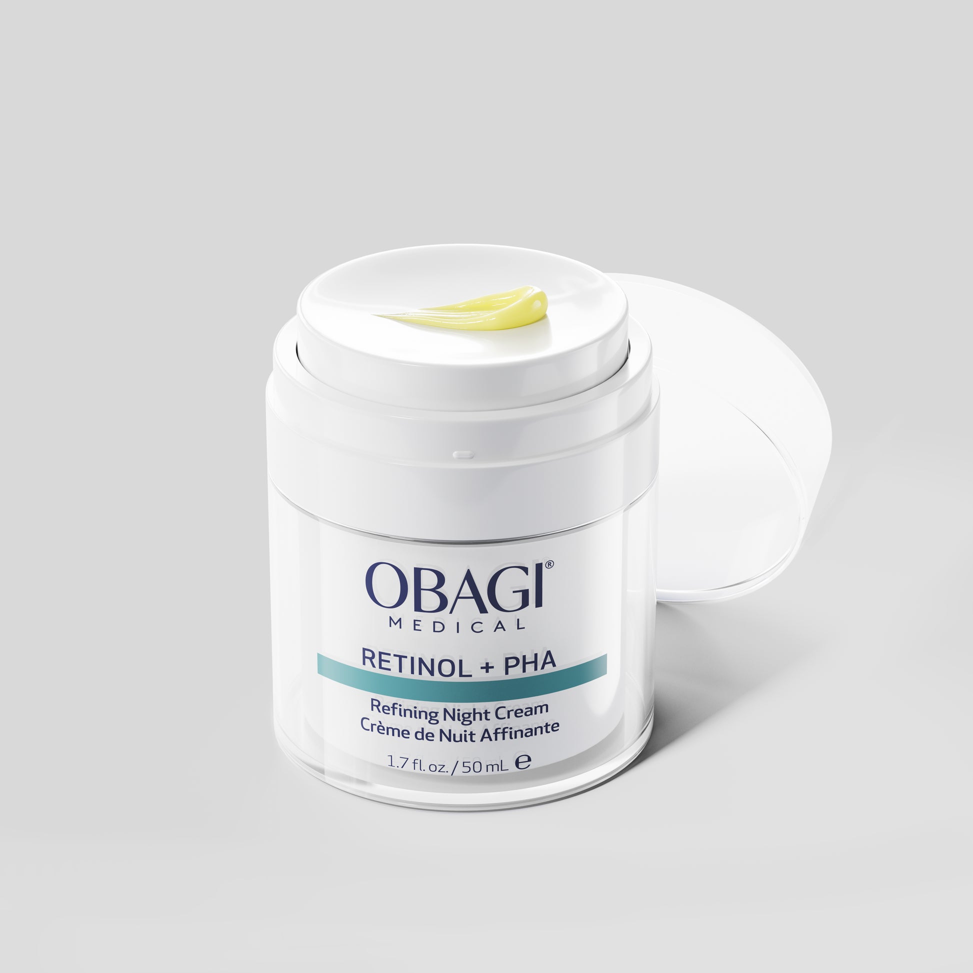Obagi Medical Retinol + PHA refining night cream jar on a light gray background