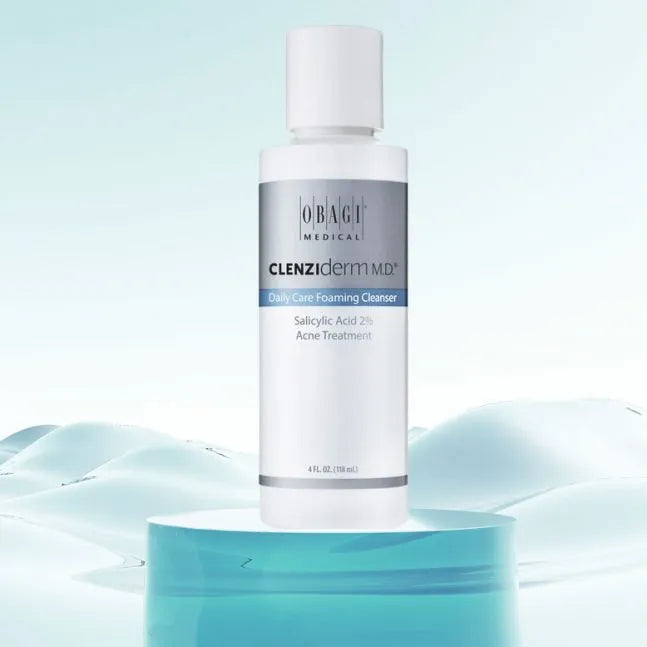 Obagi Clenziderm MD cleanser bottle on a light blue background