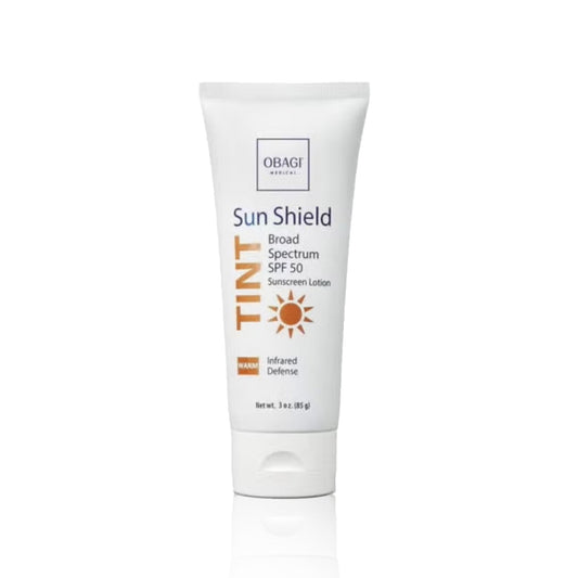 A tube of Obagi Tinted Sun Shield SPF 50 with a warm tone, packaged in a white casing with product details.