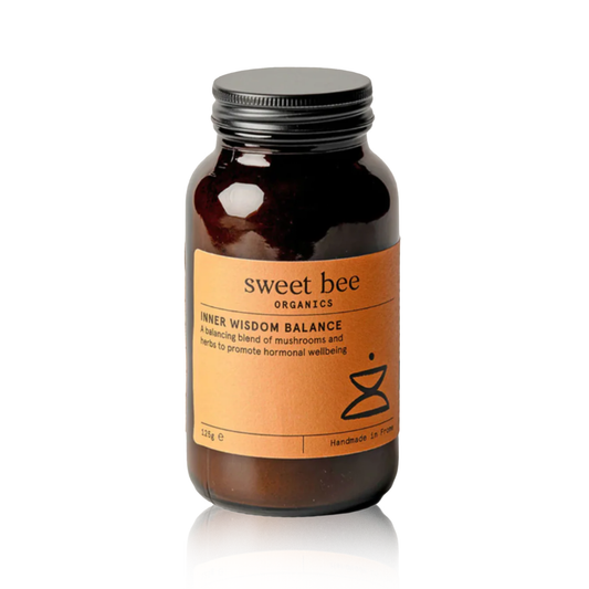 Bottle of sweet bee inner wisdom herbs on a white background