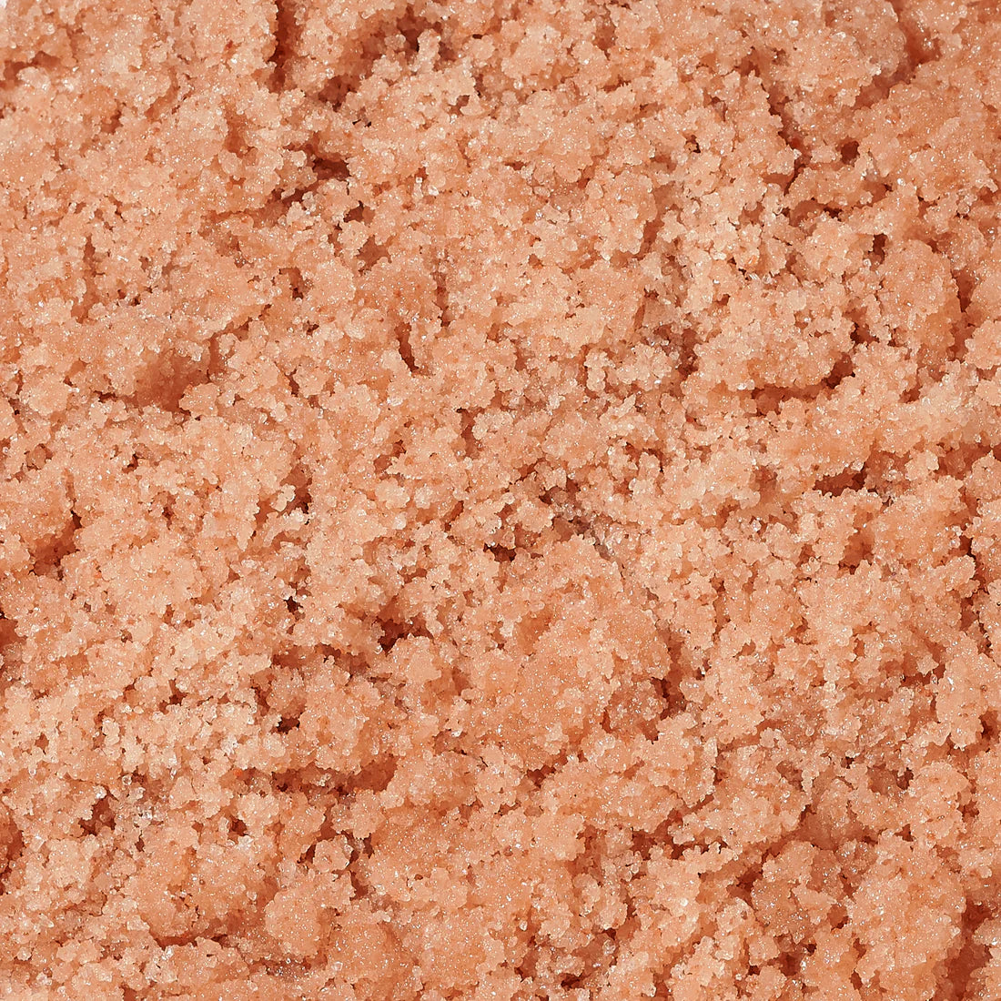 Close-up of pinkish-brown sand-like material