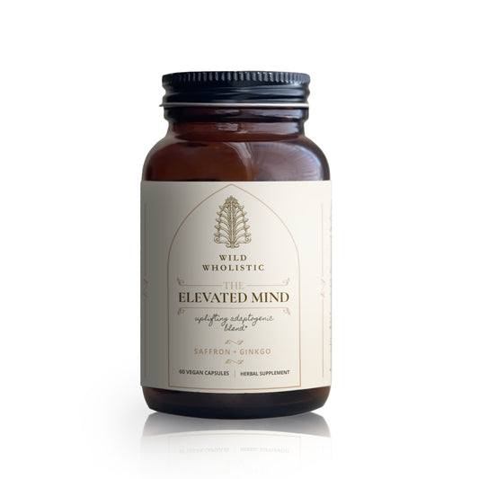 Amber supplement bottle labeled 'The Elevated Mind' by Wild Wholistic on a white background