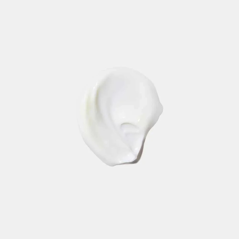 White cream swatch on a light gray background