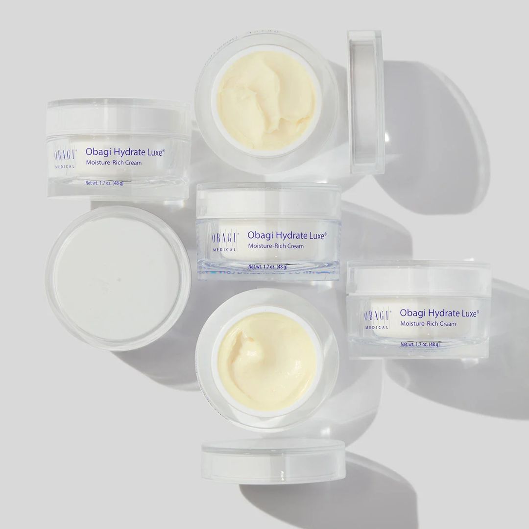 Obagi Hydrate Luxe cream jars on a light gray background