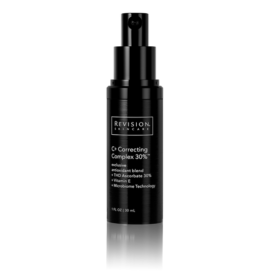 Black skincare bottle with 'Revision Skincare' label on a white background