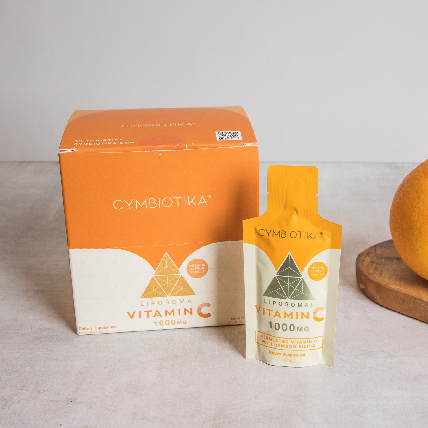 Cymbiotika Lipoosomal Vitamin C packaging on a neutral background