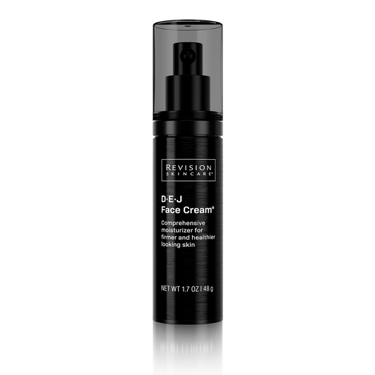 Black bottle of Revision D-E-J Face Cream on a white background