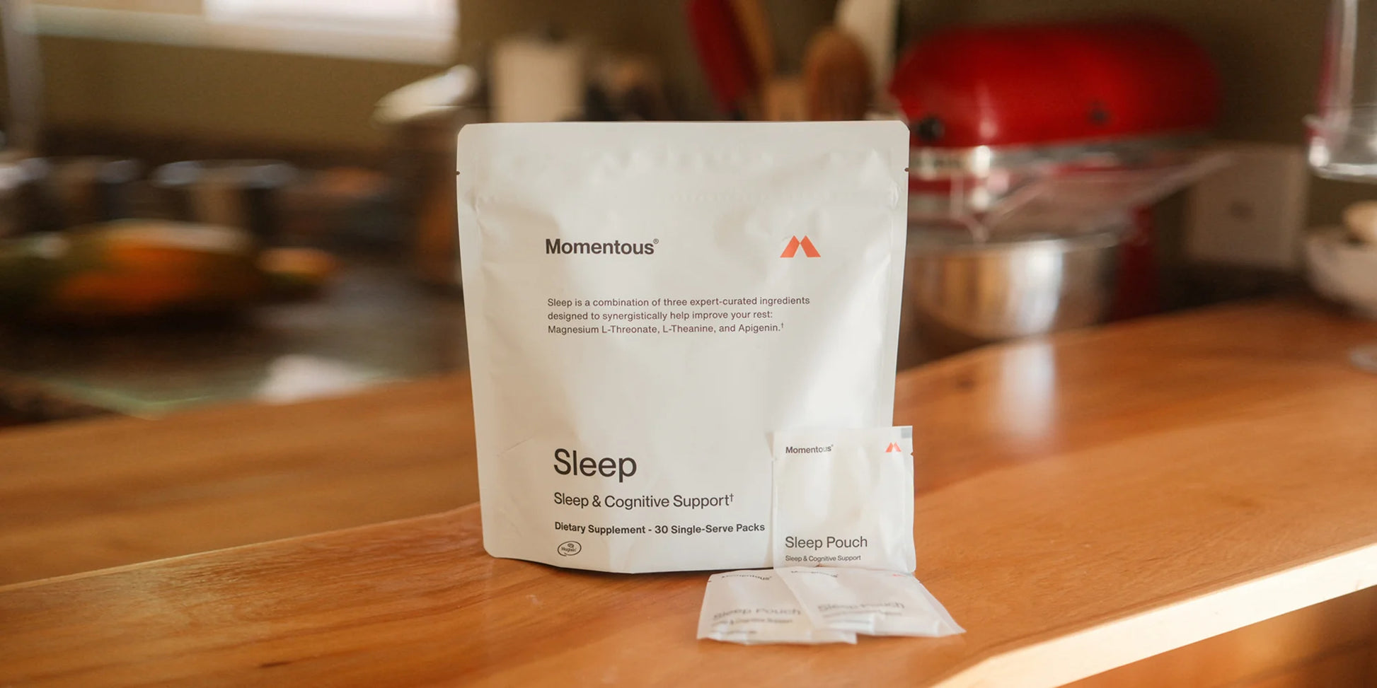 Momentous Sleep supplement package on a kitchen counter